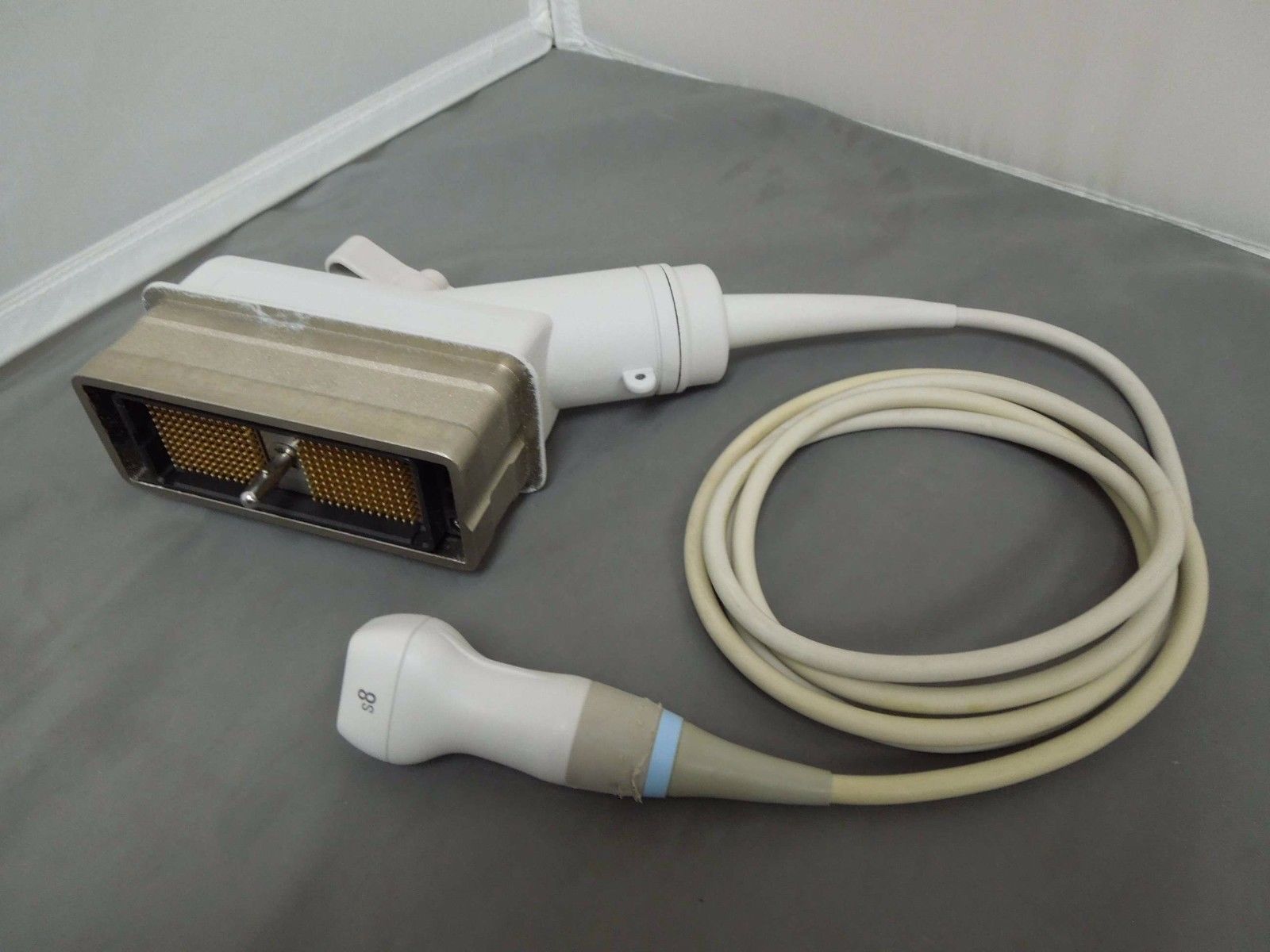 probe on gray desk