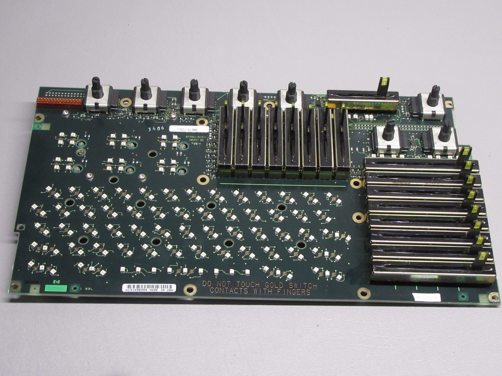 a close up of a motherboard with many screws
